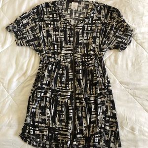 a zip up dress. Thin material and classy look!